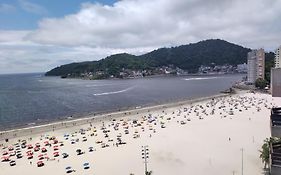 Apartamento encantador pé na areia frente a praia